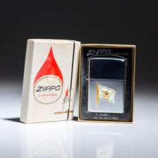 Presentation Zippo Lighter from the Chairman of the Joint Chiefs, with the flag on the side panel.