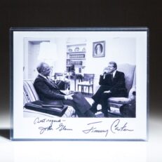 Signed photograph of President Jimmy Carter with Senator John Glenn in the Oval Office.