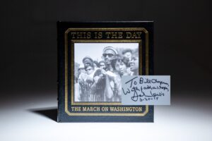 Signed by Congressman John Lewis, This is the Day: The March on Washington, photographed by Leonard Freed.