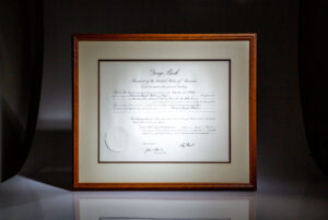 Presidential Appointment naming Ambassador Edward J. Perkins to the National Advisory Council on the Public Service, dated April 9, 1992.