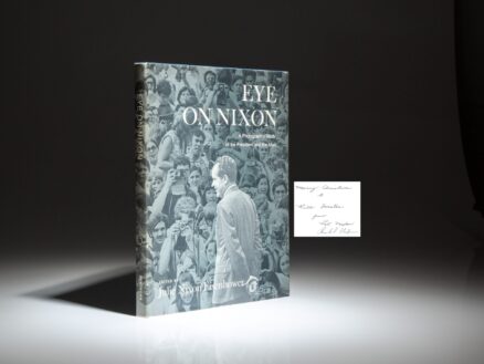 First edition of Eye On Nixon edited by Julie Nixon Eisenhower, inscribed by President Richard Nixon and First Lady Pat Nixon.