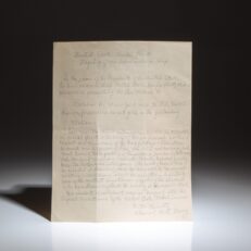 A handwritten citation from the Commander-In-Chief of the Pacific Fleet, awarding the Naval Air Medal for meritorious achievement during the Battle of Kwajalein Atoll. Citation is written in pencil and signed "C. W. Nimitz" by a member of his staff.