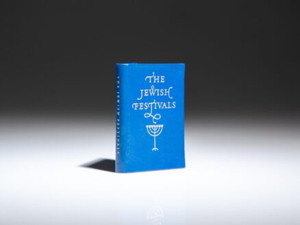The limited miniature edition of The Jewish Festivals by Lewis Jacobs, published in 1961 by Achille St. Onge.