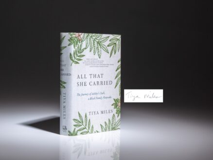 First edition of All That She Carried by Tiya Miles, signed by the author on a bookplate.