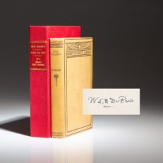 Signed first edition of The Negro, a survey of African-American history, by W. E. B. Du Bois.