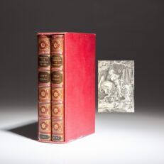 Uniformly bound in red morocco, an early edition of Alice's Adventures in Wonderland and Through the Looking-Glass by Lewis Carroll.