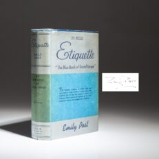Signed copy of Etiquette: "The Blue Book of Social Usage" by Emily Post, in a scarce dust jacket.