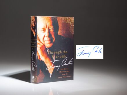 The first edition, first printing of Through The Year with Jimmy Carter, with a full signature by President Jimmy Carter.