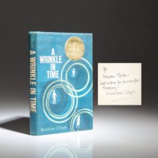 Signed copy of A Wrinkle In Time by Madeleine L'Engle, with an inscription by the author referencing "tessering."