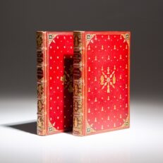An early edition of Alice's Adventures in Wonderland with the first edition of Through the Looking-Glass by Lewis Carroll, in a decorative binding by Sangorski & Sutcliffe of London.