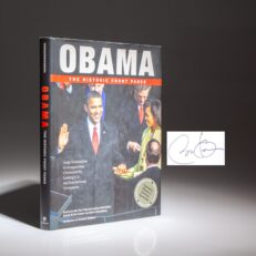 The first edition of Obama: The Historic Front Pages, signed by President Barack Obama.