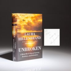 The first edition, first printing of Unbroken by Laura Hillenbrand, signed by World War II veteran, Olympic runner, and the subject of the book, Louis Zamperini.