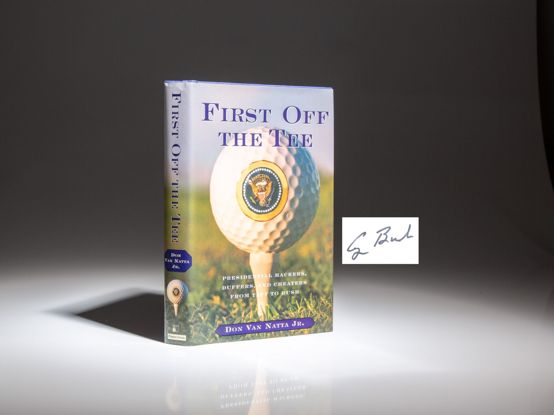 Signed by President George H.W. Bush, the first edition of First Off The Tee: Presidential Hackers, Duffers, And Cheaters From Taft To Bush by Don Van Natta, Jr.