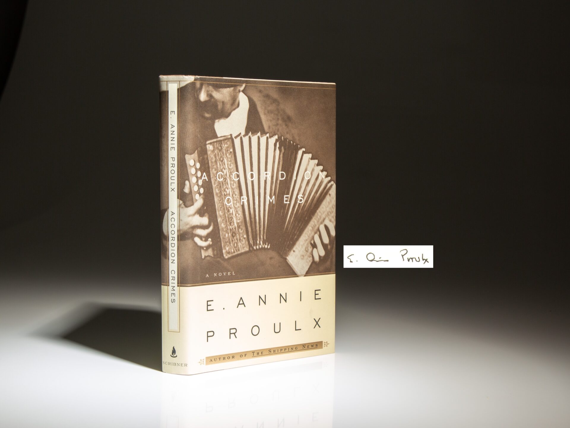 The first edition of Accordion Crimes, signed and dated by Edna Ann Proulx.