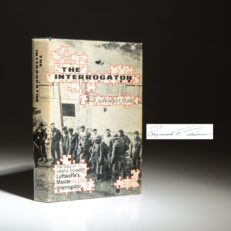 The first edition of The Interrogator by Raymond F. Toliver, signed by the author and six WWII fighting aces.