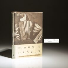 The first edition of Accordion Crimes, signed by Edna Ann Proulx.