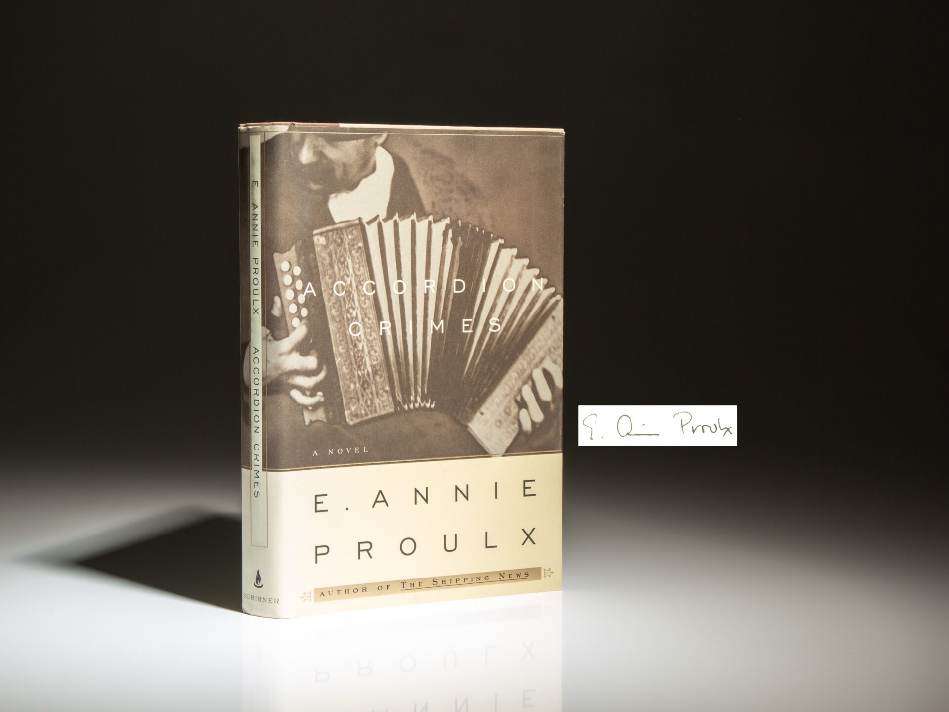 The first edition of Accordion Crimes, signed by Edna Ann Proulx.