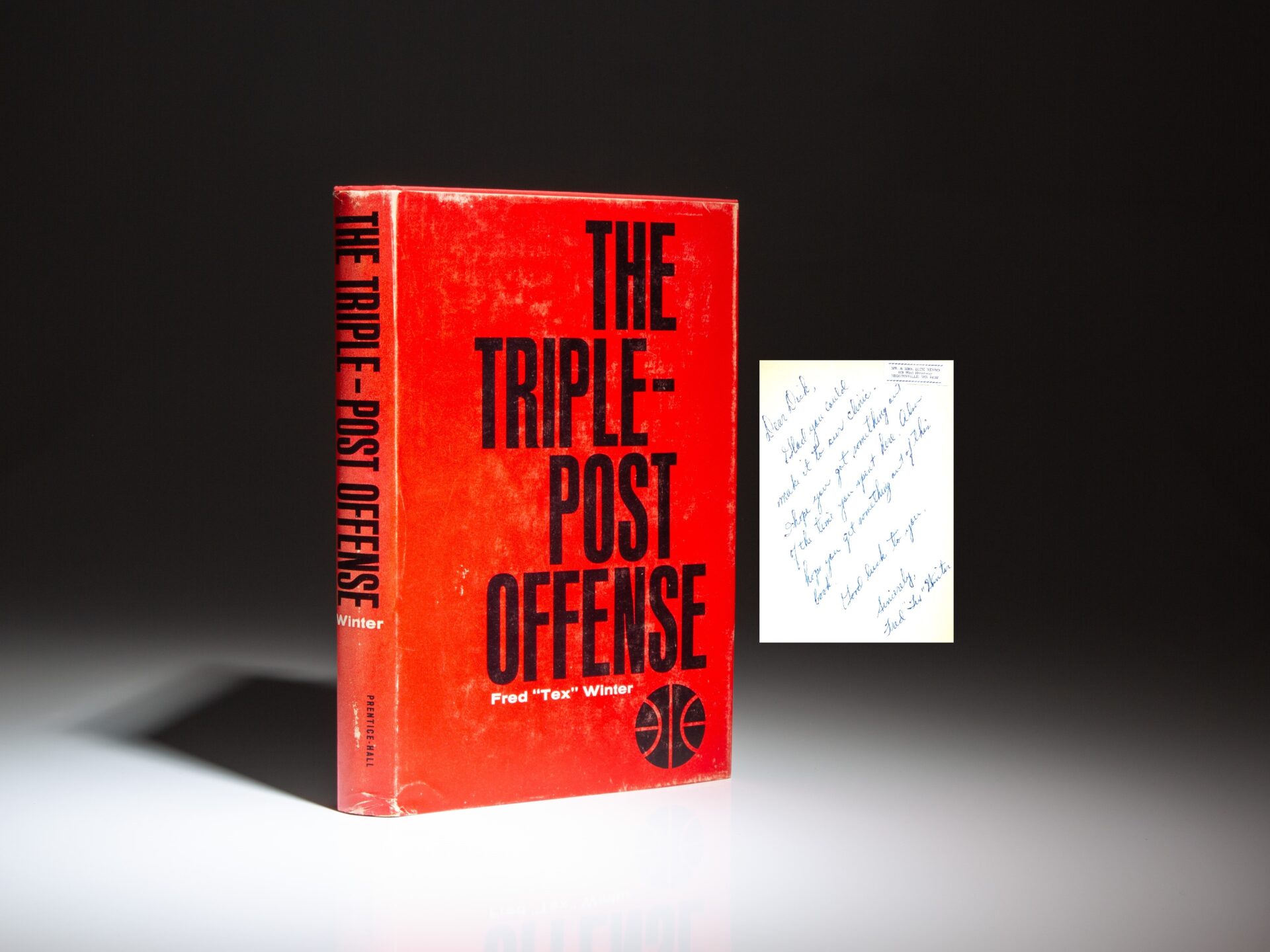 First edition of The Triple-Post Offense, inscribed by Tex Winter, in the publisher's scarce dust jacket.