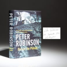 The first edition of Before The Poison, signed and dated by the author, Peter Robinson.