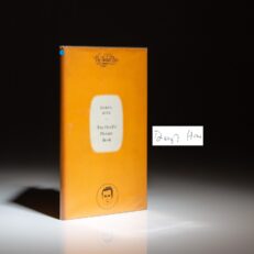 The first edition of The Devil's Picture Book, signed by Daryl Hine.