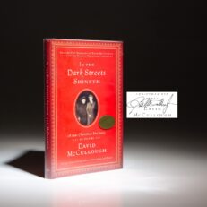 The first edition of In The Dark Streets Shineth: A 1941 Christmas Eve Story, signed by David McCullough.
