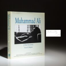 First edition of Muhammad Ali: A Thirty-Year Journey by Howard L. Bingham, inscribed to journalist Katie Couric, and signed on nine additional photographic plates by Muhammad Ali.