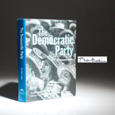 The first edition of The Democratic Party: A Photographic History, signed by President Bill Clinton.