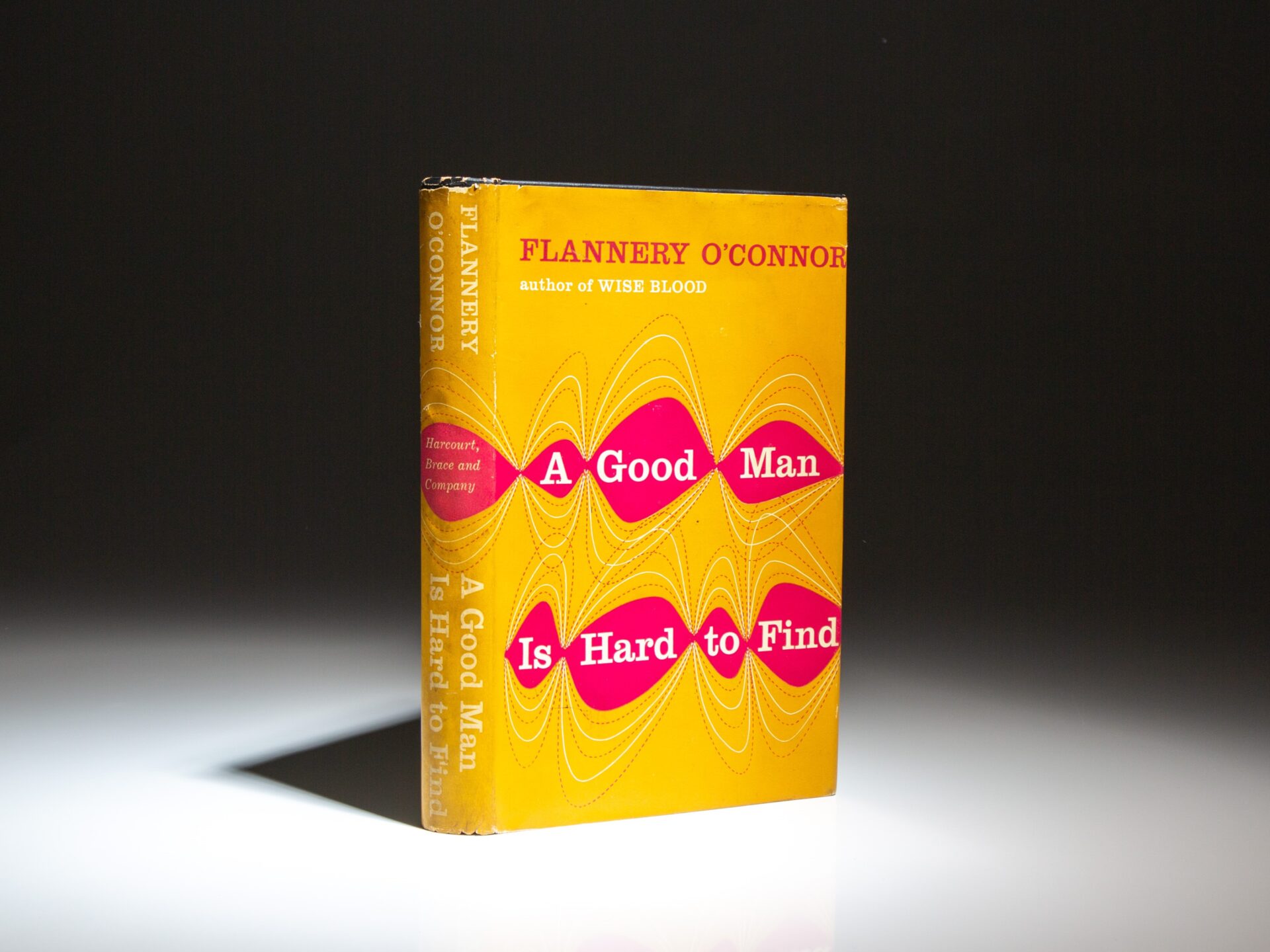 The first edition of A Good Man Is Hard To Find by Flannery O'Connor, in a vibrant first state dust jacket.