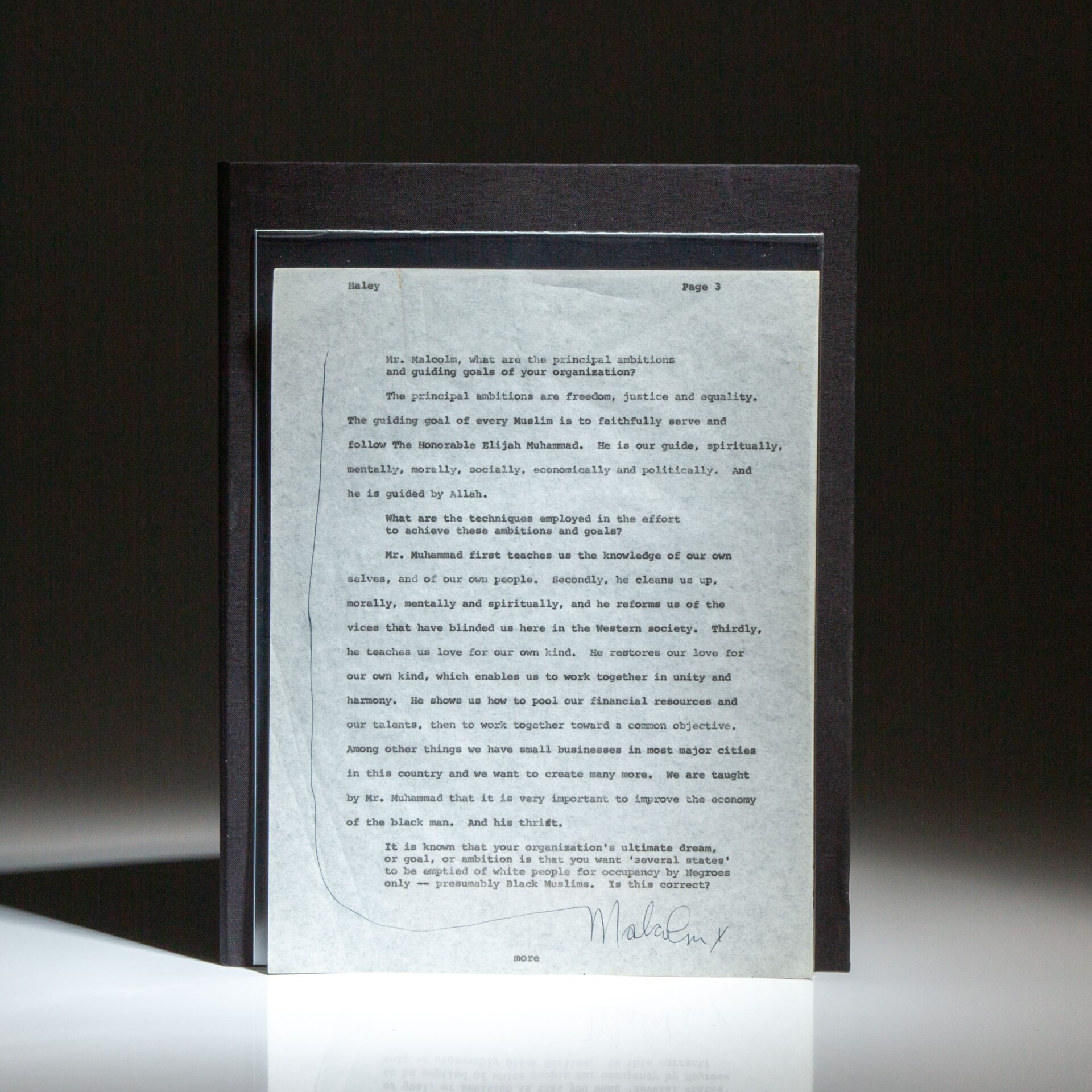 Signed by Malcolm X, an original typescript leaf from his 1963 Playboy Interview, titled "A Candid Conversation with the Militant Major-Domo of the Black Muslims," with Alex Haley. Haley and Malcolm X discuss his connection to the Nation of Islam and its leader, Elijah Muhammad, one year before his famous departure from the religion.