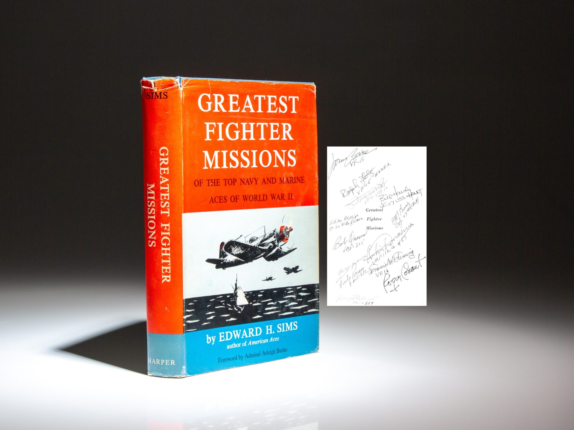The first edition of Greatest Fighter Missions Of The Top Navy And Marine Aces Of World War II by Edward H. Sims, signed by 14 naval aces.