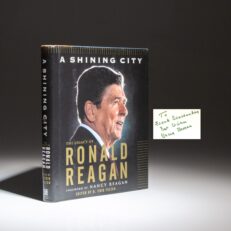 The first edition, first printing of A Shining City: The Legacy of Ronald Reagan, edited by D. Erik Felten and signed by First Lady Nancy Reagan.