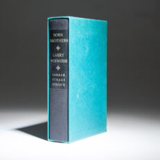 The signed limited edition of Born Brothers by Larry Woiwode, with a long inscription on the half title.