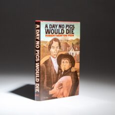 The first edition, first printing of A Day No Pigs Would Die by Robert Newton Peck, a fine example.