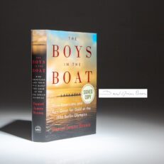 The first edition, first printing of The Boys in the Boat, signed by Daniel James Brown.