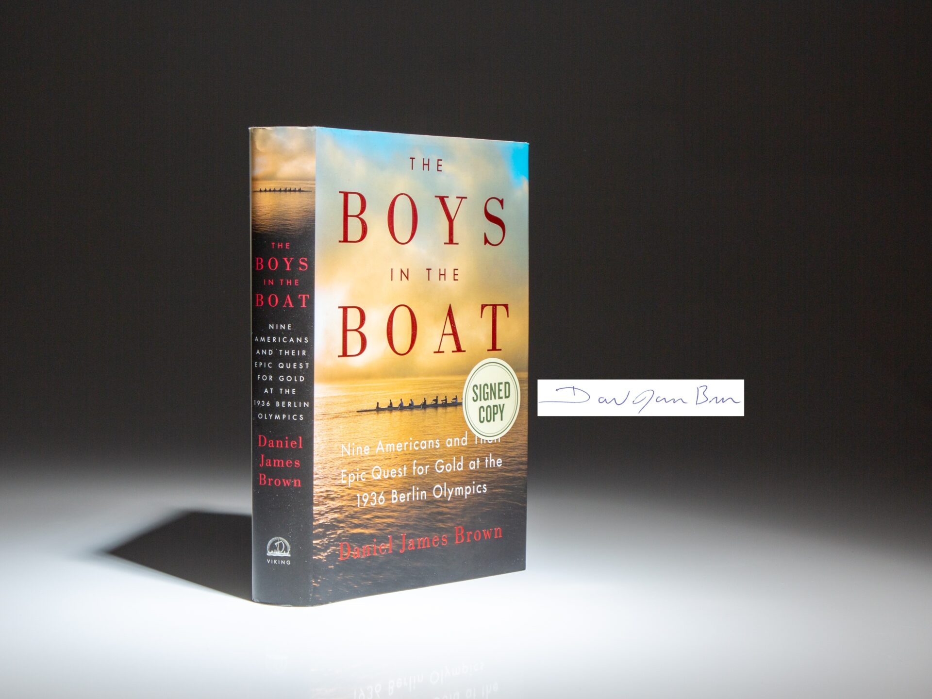 The first edition, first printing of The Boys in the Boat, signed by Daniel James Brown.