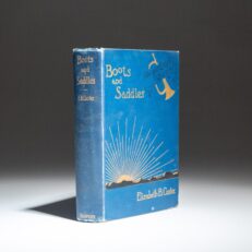 The first edition of Boots and Saddles by Elizabeth B. Custer, in the blue cloth binding.