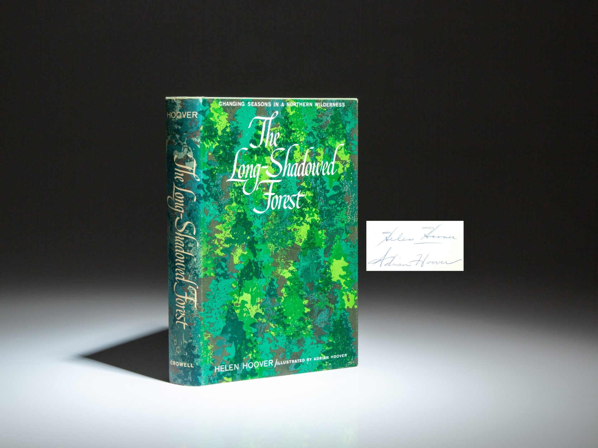 The first edition, first printing of The Long-Shadowed Forest, signed by Helen Hoover and the illustrator, Adrian Hoover.