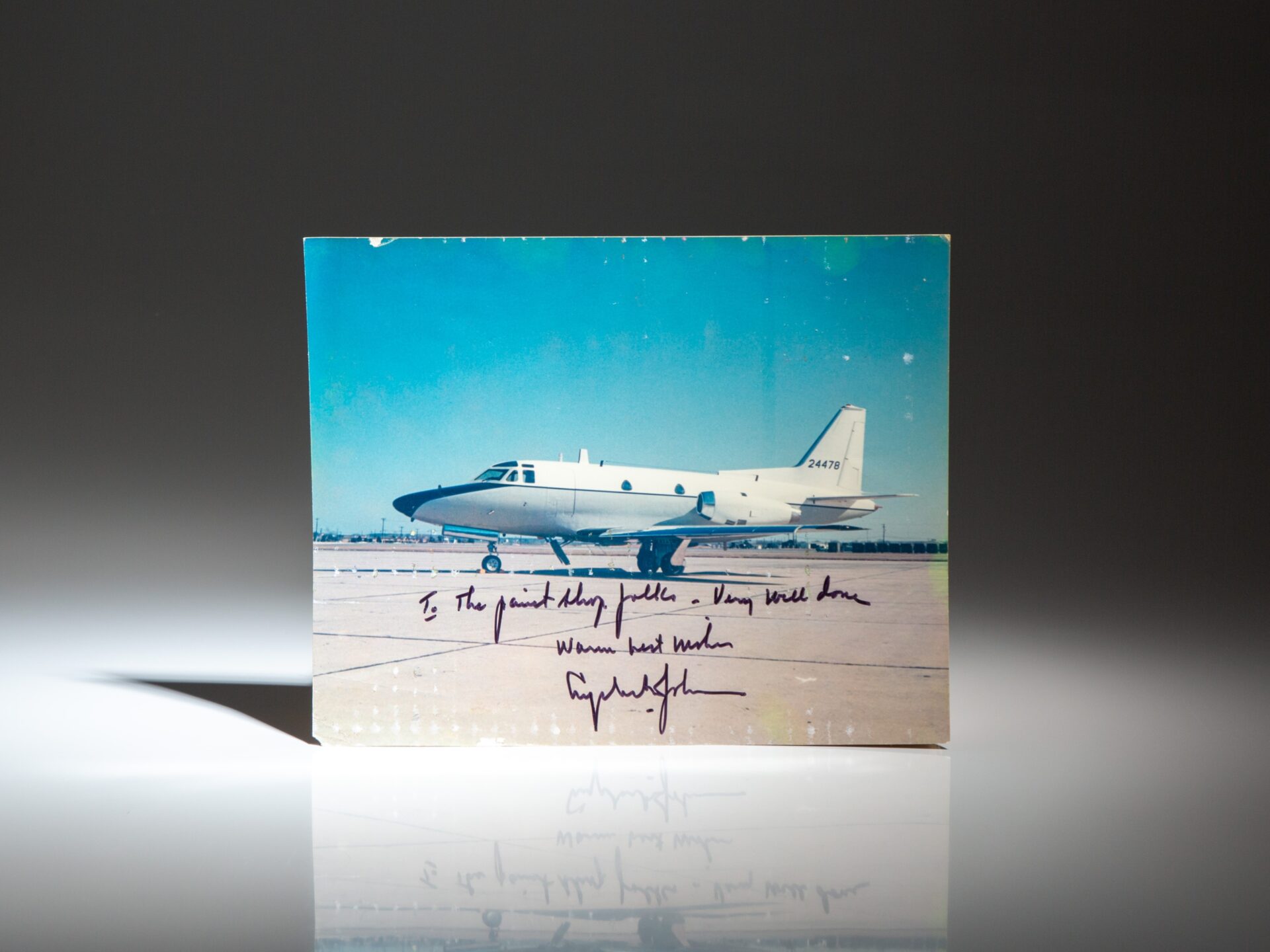 Inscribed photograph of the North American T-39A Sabreliner, assigned to support Lyndon B. Johnson's travel to the LBJ Ranch. Inscribed by Johnson to the Air Force personnel responsible for painting the aircraft. The aircraft is now held by the National Museum of the United States Air Force, in Dayton, Ohio.