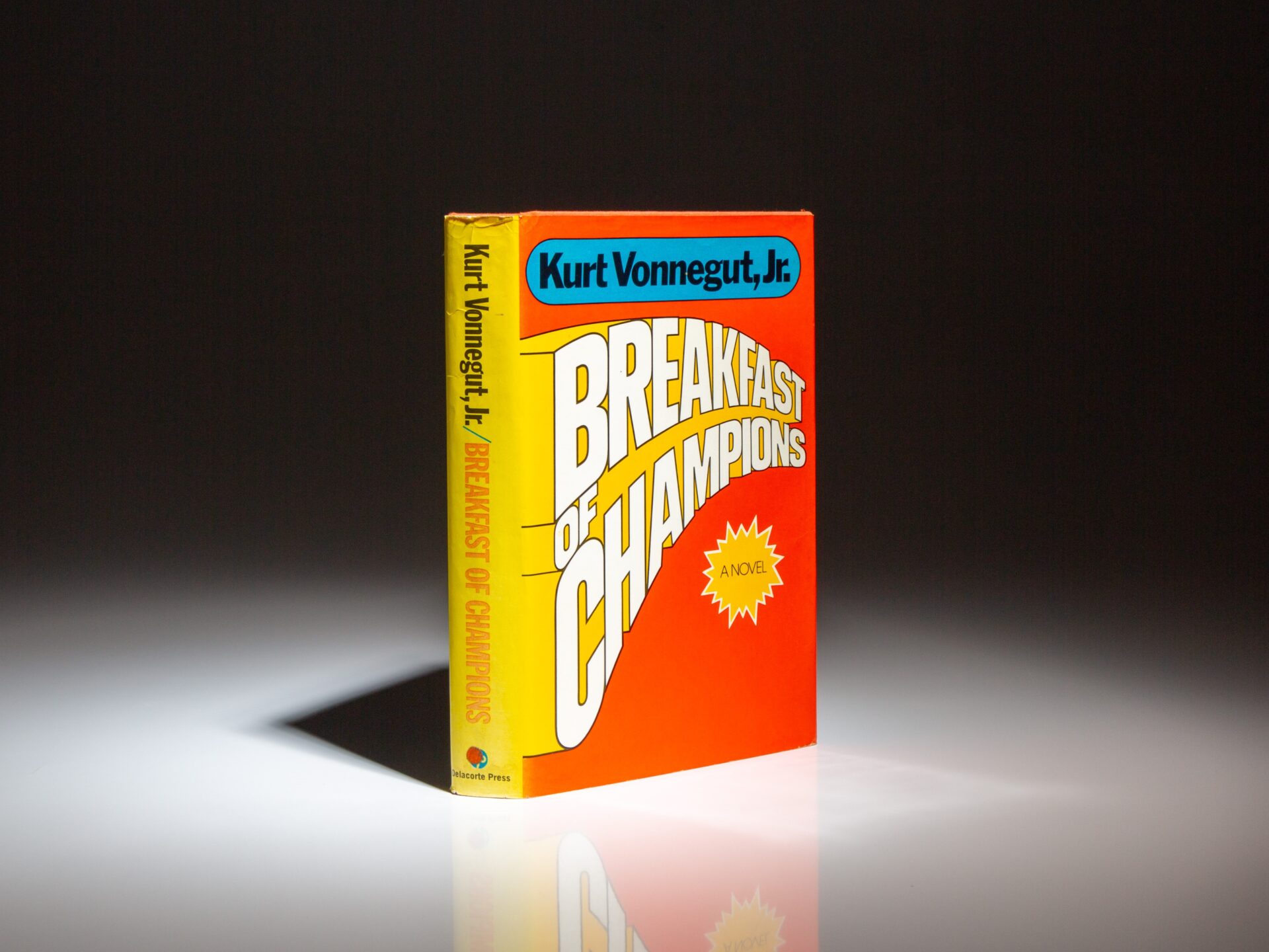 The first edition, first printing of Breakfast of Champions or, Goodbye Blue Monday, by Kurt Vonnegut, in the publisher's first state dust jacket.