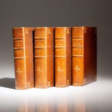 The Daniel Boone Edition of The Winning of the West by Theodore Roosevelt, with a manuscript leaf in Roosevelt's hand.
