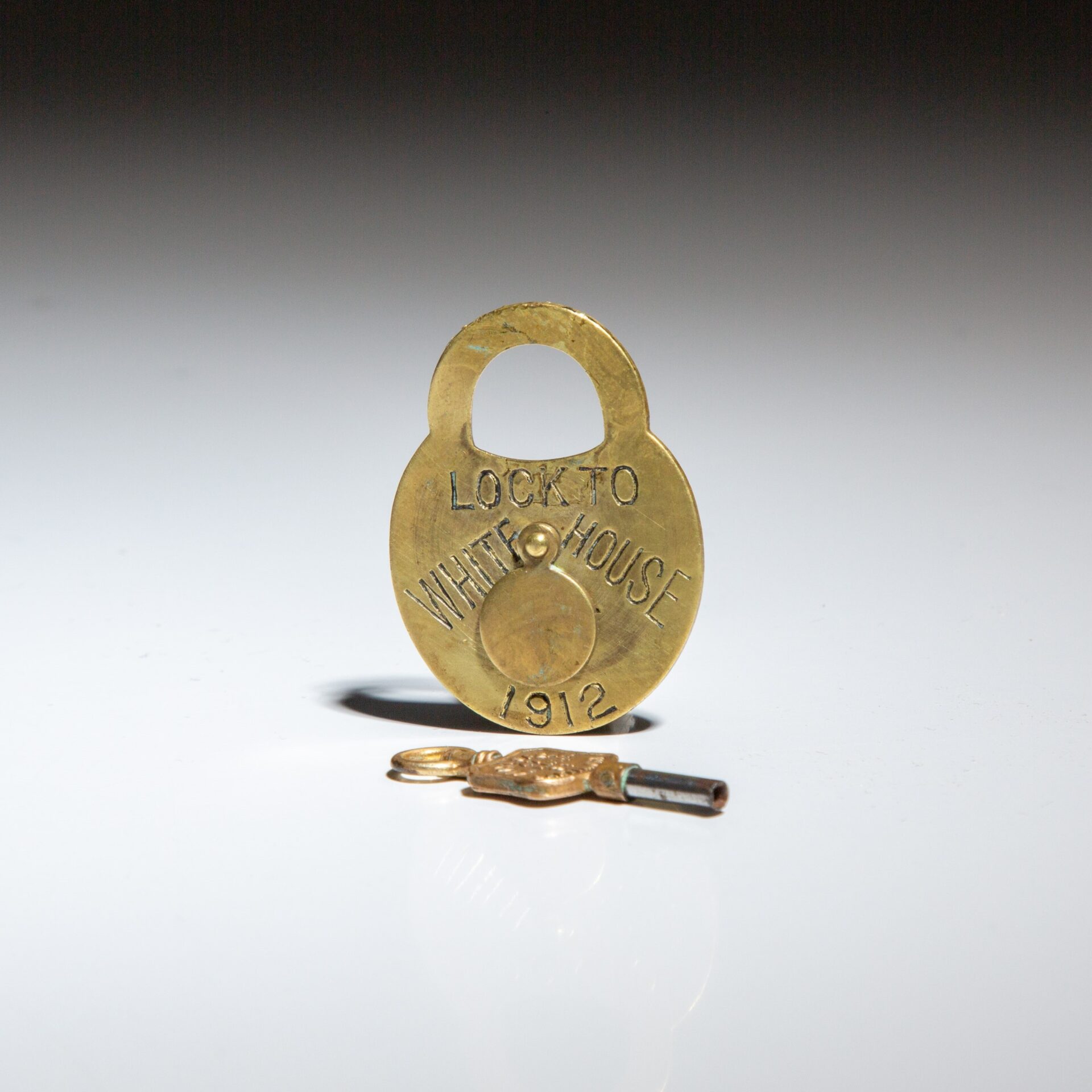 The President William H. Taft mechanical campaign watch fob and key from the 1912 presidential election.