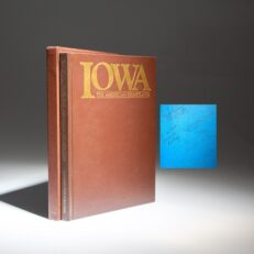 Signed by President George H.W. Bush, Gen. Al Haig and Senator Chuck Grassley, the first edition of Iowa: The American Heartland, featuring the photography of Craig Aurness.